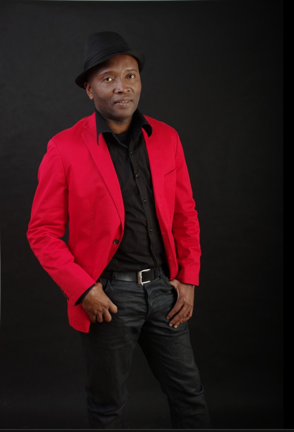 Mister Kibs in a red blazer